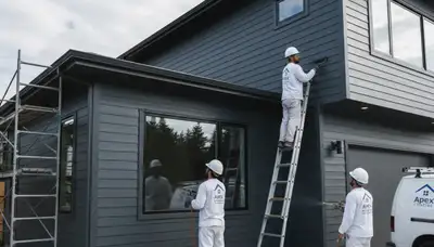 Professional siding painting on a home exterior in Atlanta, GA by expert local house painters